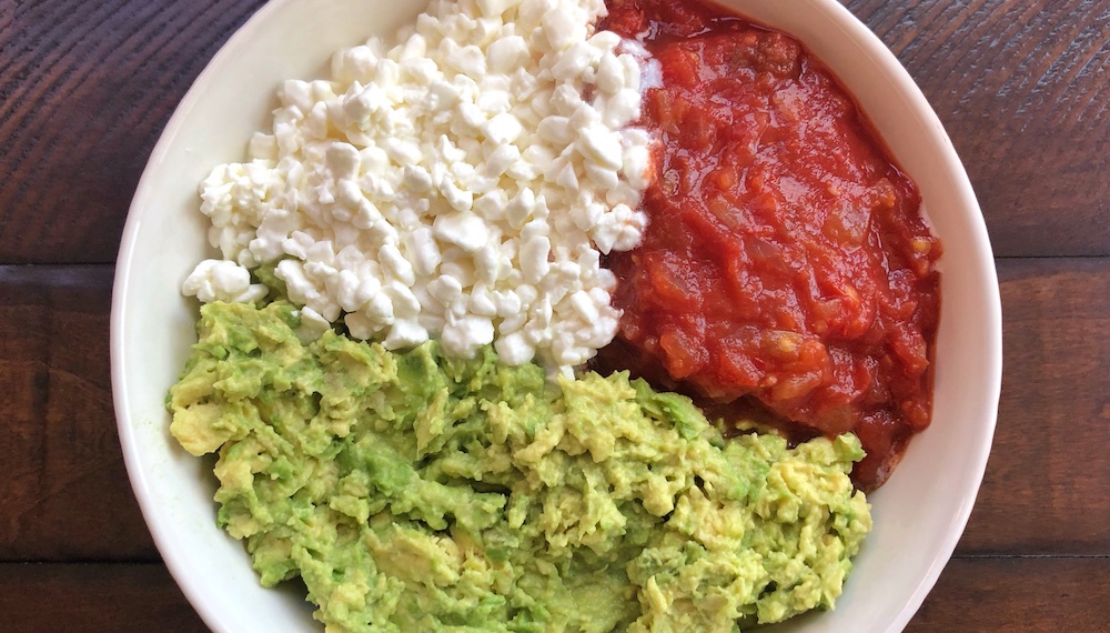 Quick and easy cold party dip made with avocado, salsa, and cottage cheese! A delicious party appetizer served with tortilla chips.