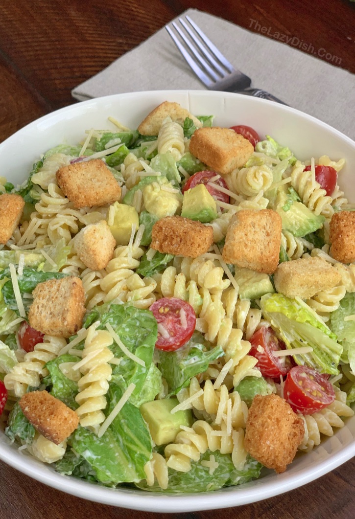 Easy pasta salad idea! Pasta and Avocado Caesar Salad Recipe -- A quick and easy vegetarian dinner idea for meatless Monday and busy weeknight meals! So simple to make in less than 10 minutes.