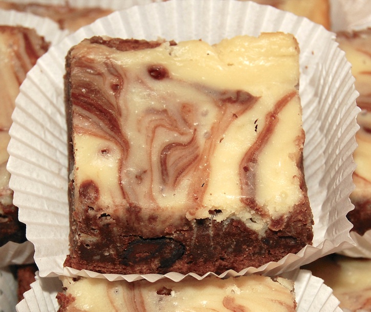 Best ever easy dessert to make! These cheesecake swirled brownies are a great way to impress your family! These are my kids favorite homemade treats. Super quick and easy to make, too!