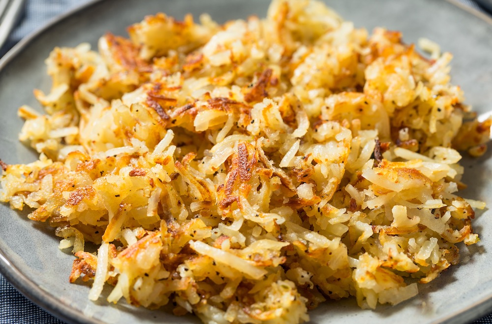 How to make the best crispy frozen hash browns in your oven! Simply bake them on a sheet pan. You'll never make them any other way.