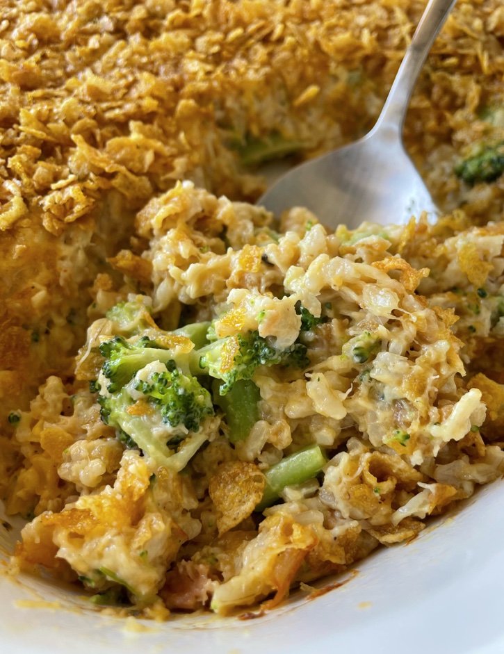Easy healthy dinner idea for a family with picky eaters! This cheesy chicken broccoli rice casserole is such a simple meal for busy weeknights. It's made extra lazy thanks to canned chicken! It's also cheap to make with just a few ingredients. 