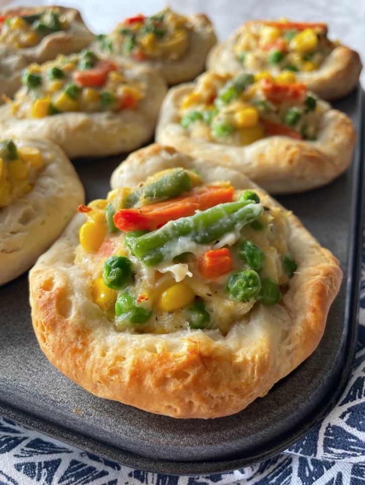 Mini Chicken Pot Pies With Biscuits | Quick, easy, cheap, and delicious! Your entire family is going to love this simple meal. It's made even lazier thanks to canned chicken!