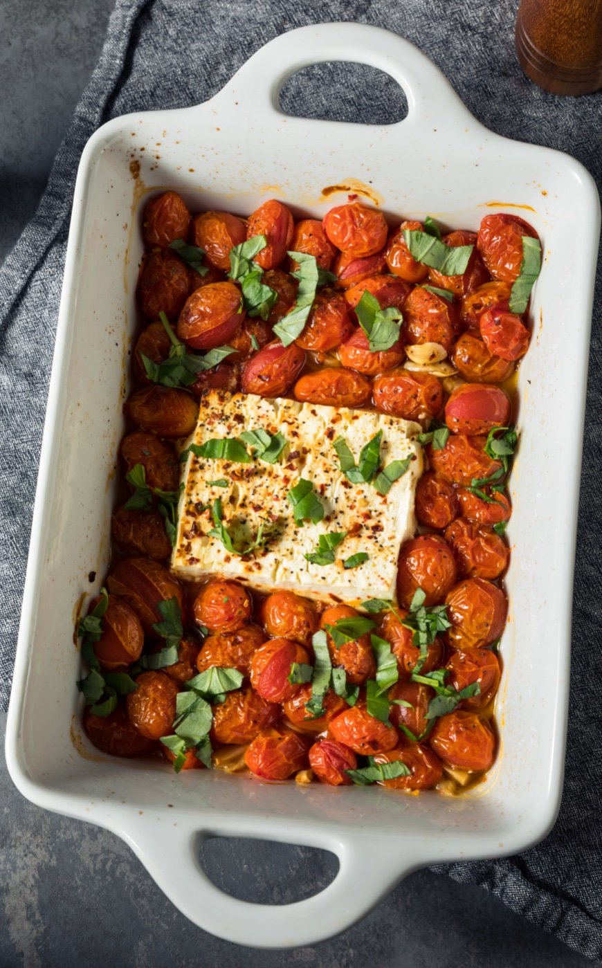 How to make baked feta pasta! This easy dinner idea is a favorite meal in my family, even with my picky eaters. It's healthy, vegetarian, and delicious! You can also add chicken if you'd like. 