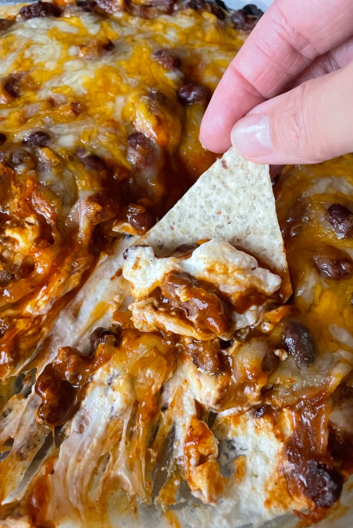 Chili Cheese Dip | A quick and easy crowd pleasing appetizer! Serve it warm with tortilla chips for the best party food you'll ever make. 