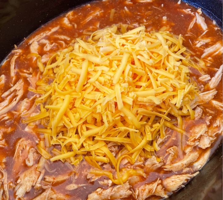 Crockpot Shredded Enchilada Chicken. Perfect for making tacos!