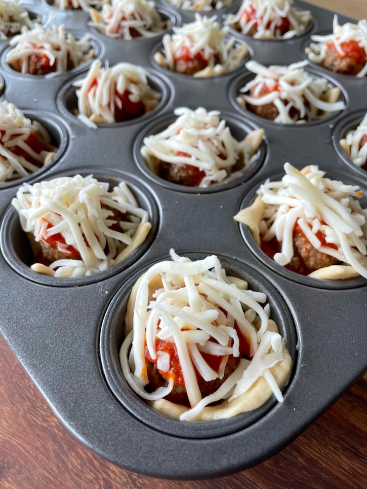 Cheesy Meatball Cupcakes made in a mini muffin pan!