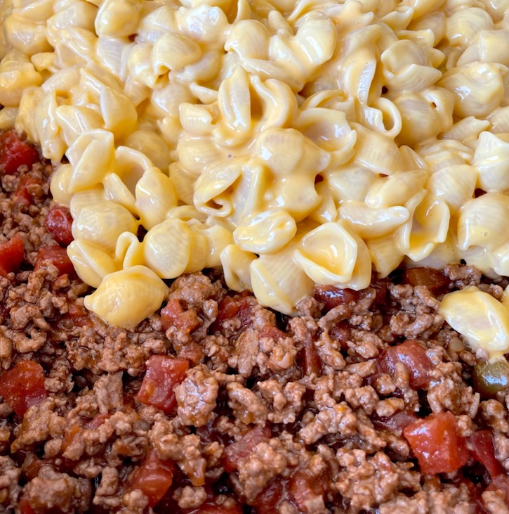 The ultimate dinner for pasta lovers! Mix macaroni and cheese with taco seasoned ground beef. So easy and yummy! Kids love it. 