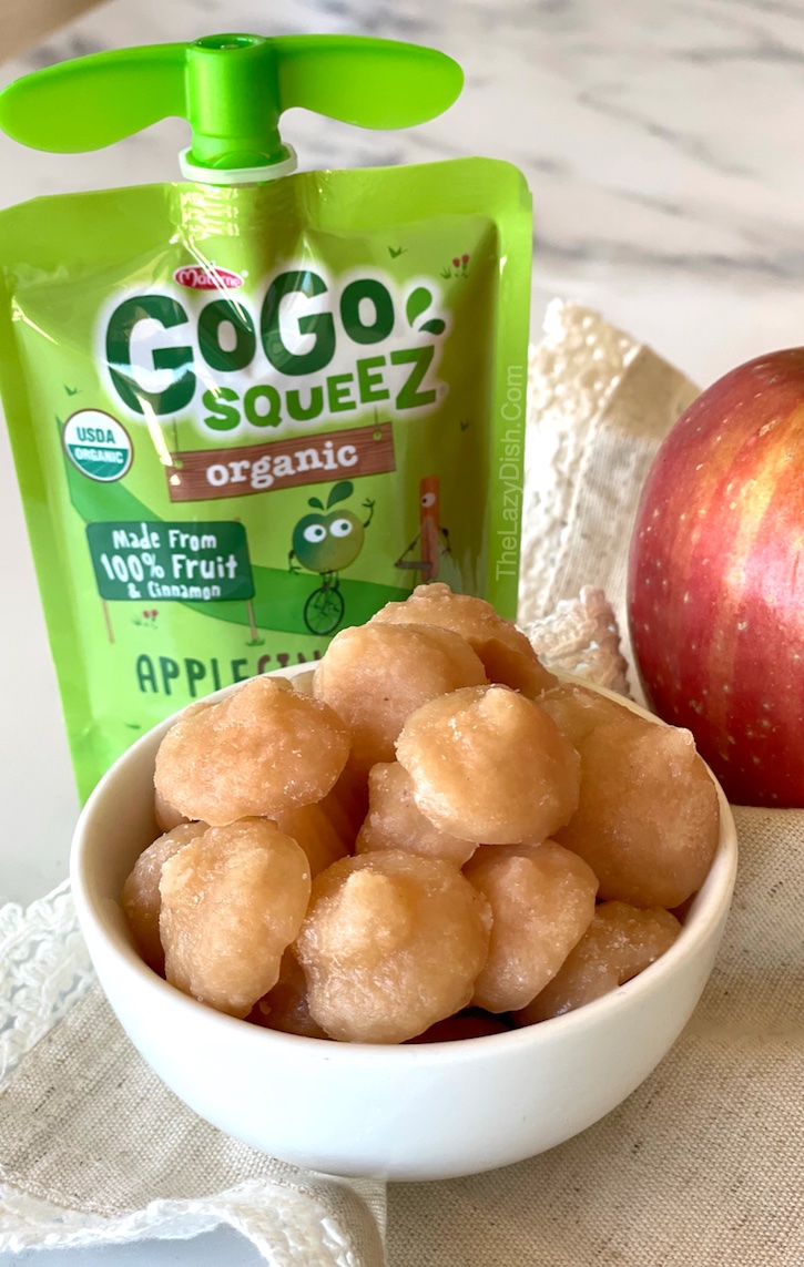 Frozen Applesauce Bites | This fun and easy snack idea is not only healthy but super yummy! Toddlers and young children love them. My 2 year old gobbles them up. She likes how they just melt in her mouth. A great replacement for popsicles and ice cream!