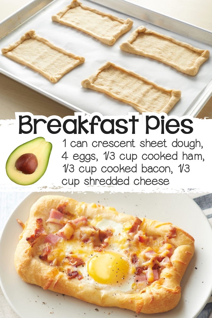 Mini breakfast pizza pies made with crescent sheet dough cut into quarters with the edges rolled up to create a crust that holds a cracked egg, bacon, ham and cheese.