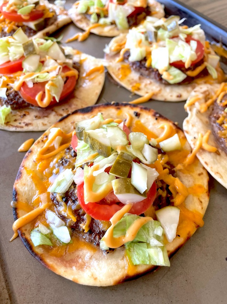 Bic Mac Smashed Burger Tacos are a fun ground beef dinner recipe made with flour tortillas and cheese, and then loaded with classic burger condiments. 