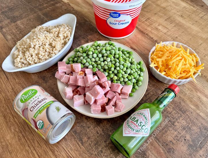 I love this simple dinner recipe because it’s made with cheap and easy ingredients that I almost always have in my kitchen. Using instant rice, cheese, cubed ham, and peas you can make the creamiest rice casserole ever. My kids absolutely love it and yours will to. 