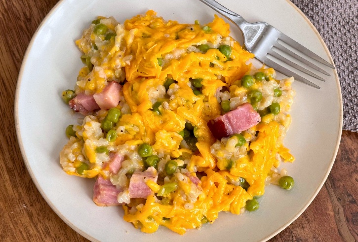 I’m always looking for a cheap dinner recipe that is easy to make on busy weeknights, and this cheesy ham and pea casserole is perfect! I make this delicious recipe extra lazy by making it ahead of time and simply throwing it into the oven when we get home. All you do is mix all the ingredients together, top with cheese and bake until bubbly and creamy. This cheesy rice casserole is perfect for picky eaters! Oh so yummy.