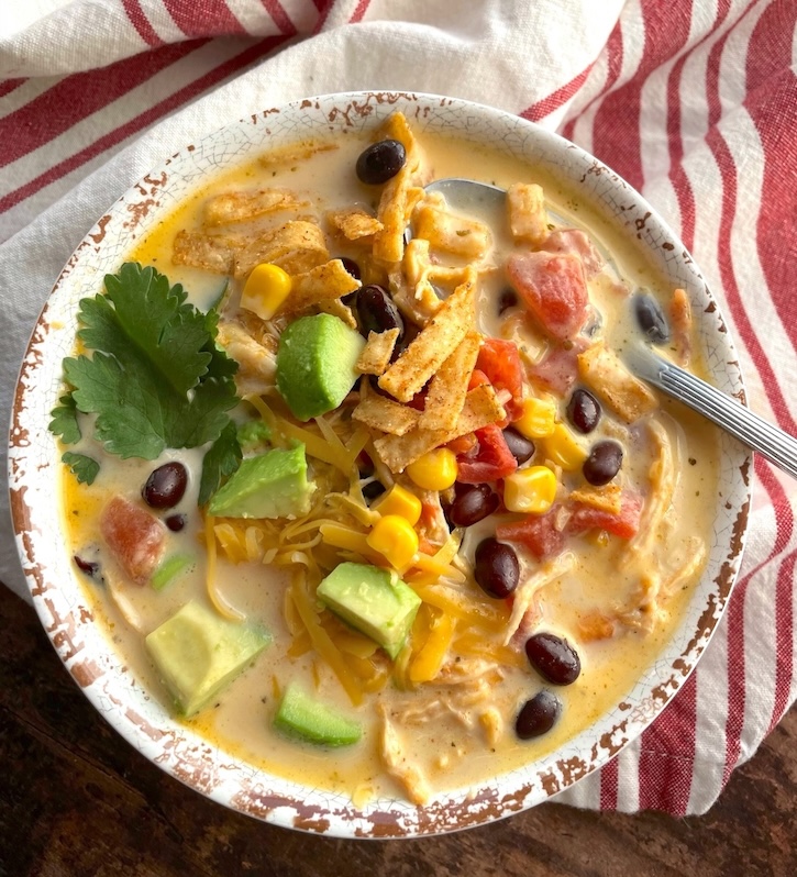 The best easy chicken taco soup recipe in a bowl and ready to be served!