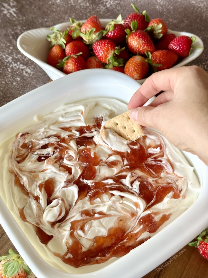 Check out this simple tutorial on how to make the world's best party dip. This sweet and creamy cheesecake dip is so easy to make with just 3 ingredients. No more wondering what you're going to bring to the next party. This is the perfect appetizer or dessert recipe. It will be an absolute hit. Everyone will want this cheesecake dip recipe. 