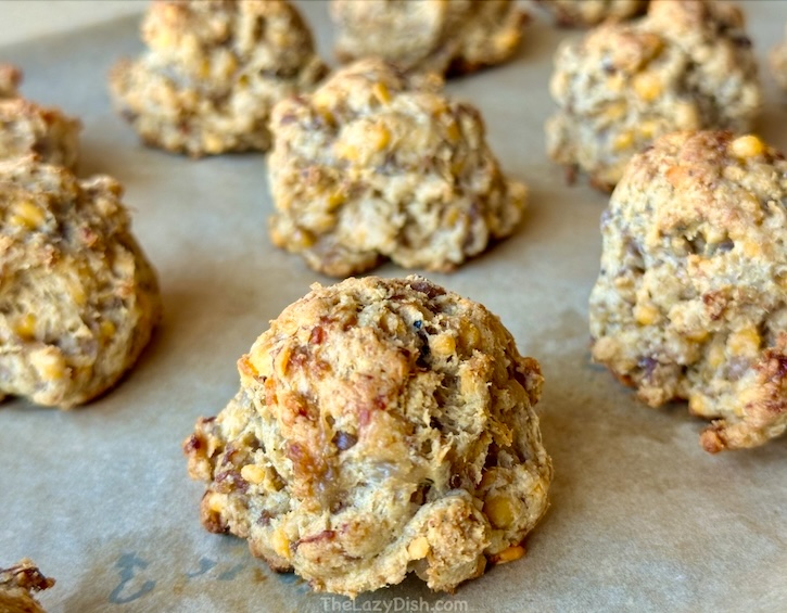 Golden brown sausage balls made with 4 ingredients: pancake mix, sausage, cheddar cheese and milk. A fun and easy breakfast idea!