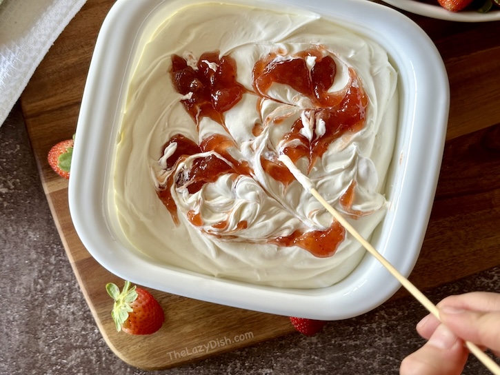 strawberry jam swirled into creamy cheesecake dip. This 3 ingredient dessert makes the perfect party appetizer and is great for the holidays. So easy to make that even culinary challenged can do it in 5 minutes or less. 