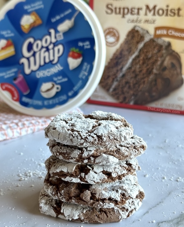 Popular Chocolate Crinkle Cookies made with COOL WHIP and dry CAKE MIX! So easy and so yummy. 