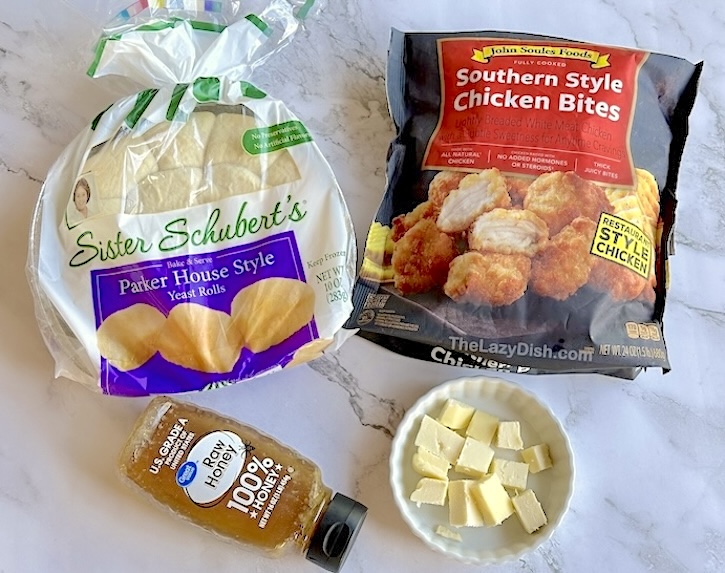 Ingredients for making copycat Chick-fil-A chicken minis at home including Sister Schubert's rolls, south style chicken bites, honey, and butter. 
