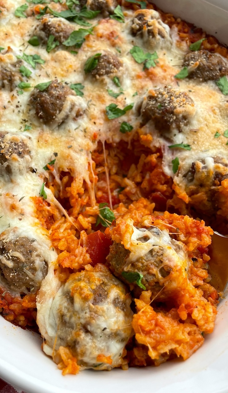 Cheesy Italian Meatball & Rice Dinner Casserole | I'm in love with this recipe! I always have frozen meatballs and rice in stock so this budget meal is perfect for last minute dinners. It's incredibly easy to make with just a few basic ingredients and tastes like something you'd get at a restaurant. So yummy and kid friendly!