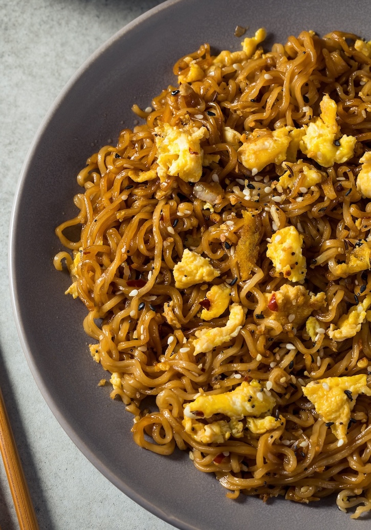 Vegetarian Ramen Noodle Stir Fry Recipe with scrambled eggs in a sweet and spicy homemade sauce that includes brown sugar, soy sauce, garlic, and red pepper flakes. 