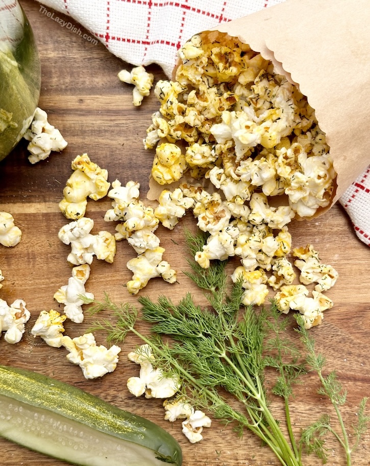 The best semi-homemade popcorn recipe ever! Turn regular microwave popcorn into dill pickle popcorn with just a few simple ingredients from your pantry! This delicious snack idea is so fun to make and very addicting! I could eat this flavored popcorn everyday.