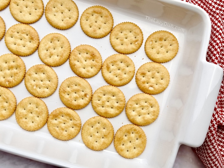 Simple, easy to make party appetizers made with ritz crackers, ham and cheese. Don't forget the buttery glaze made with dijon mustard. These party crackers are so delicious, I promise you won't have any leftovers. 
