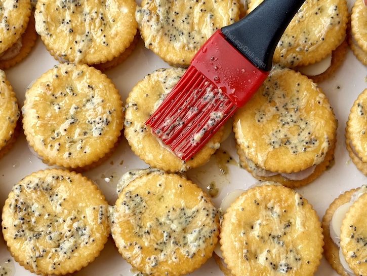 Buttery baked mini Ritz cracker sandwiches! So easy to make for your next party or family gathering. Kids and adults love them! 