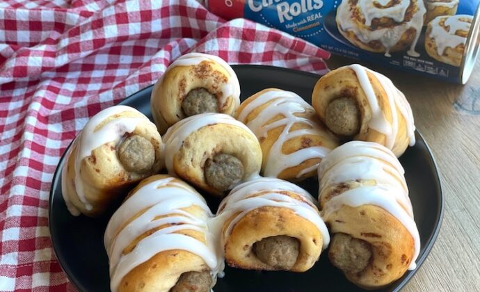 How to make a delicious 2 ingredient amazing breakfast recipe for special occasions! These yummy pigs in a blanket are quick and easy to make with frozen sausage links and Pillsbury Cinnamon Rolls. A fun breakfast idea for birthdays, holidays, family gatherings, sleepovers, and lazy Sundays at home with the kids.
