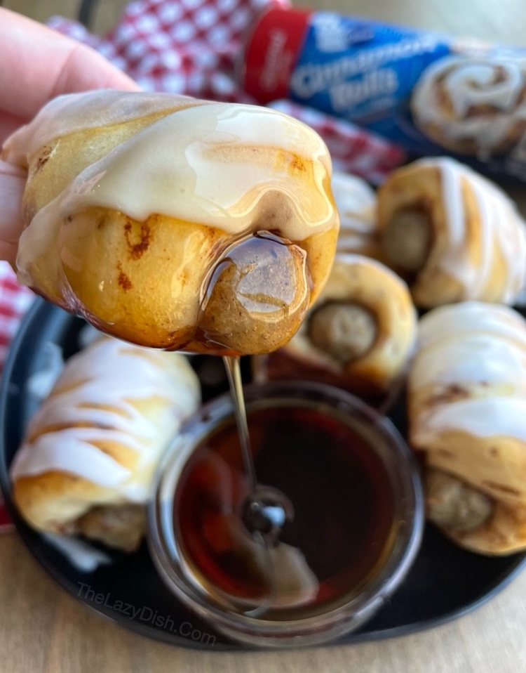Cinnamon rolls stuffed with sausage links to make yummy breakfast pigs in a blanket!