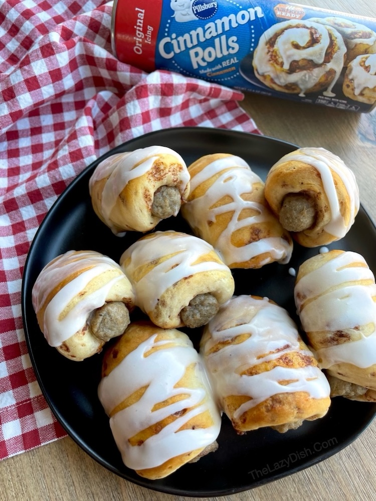 This fun and yummy breakfast is easy to make with just 2 ingredients! Pillsbury Cinnamon Rolls and frozen sausage links. Quick to bake for special occasion, birthdays, first day of school, sleepovers, and holidays. 