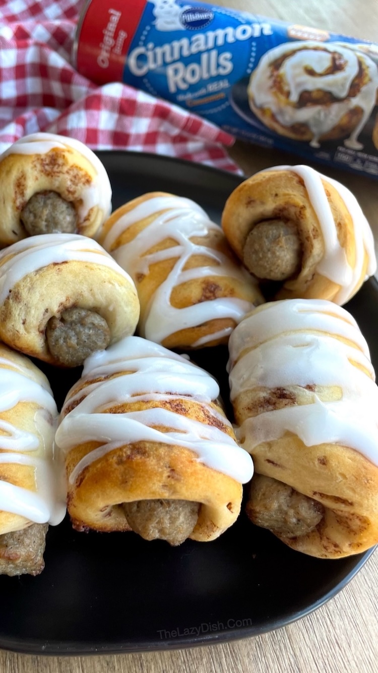 Sausage stuffed cinnamon rolls are a fun way to make pigs in a blanket for breakfast! Delicious handheld food your family is going to love. 