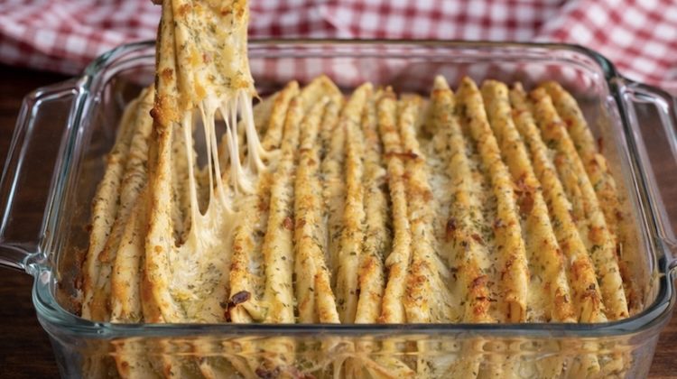 Ordinary flour tortillas turned into cheesy garlic pull apart bread using mozzarella, olive oil, and seasoning. An easy and fun oven baked recipe to make at home.