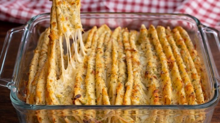 Ordinary flour tortillas turned into cheesy garlic pull apart bread using mozzarella, olive oil, and seasoning. An easy and fun oven baked recipe to make at home.