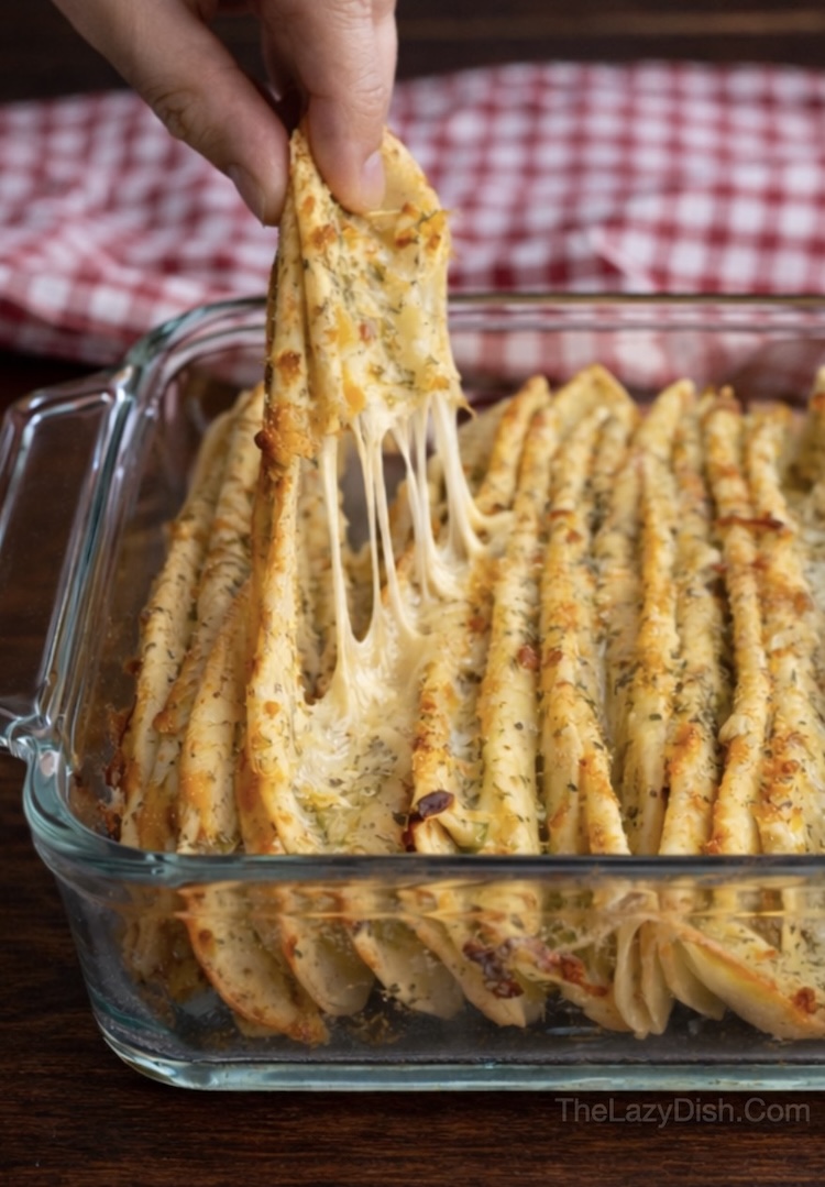 Close up view of fresh out of the oven baked garlic bread made with flour tortillas, mozzarella cheese, and garlic olive oil.